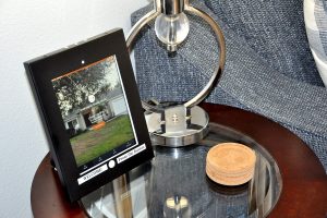 Tablet in the villa with the Online Home Manual and Guide on it.